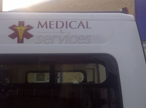 Discreet logo of Medical Services on" NHS " ambulance. Pic taken by myself