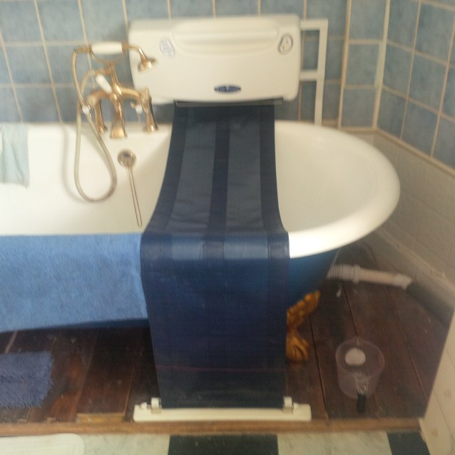 The Bath-Knight  over my bath :Now working properly after quite a lot of trauma. 